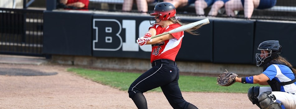 A batter follows through on her swing at the 2019 Class 1A State Softball Final.