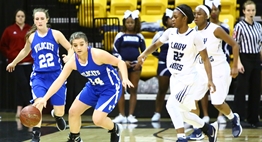 Two female players from Largo put defensive pressure on the Williamsport ball handler in the 2016 State Finals.