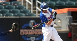 A batter swings a nice level bat at an incoming pitch during the 2018 State Baseball Finals.