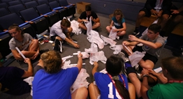 Students pack up school supply donations at the 2019 Student-Athlete Leadership Conference.