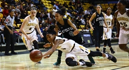 A Frederick player dives for a loose ball during the 2017 Girls State Basketball Tournament.