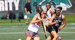 An Oakdale defensive player shadows a Glenelg offensive player in the 2016 Girls State Lacrosse Finals.