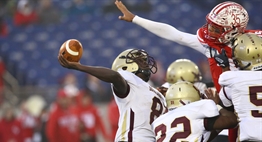 A fort Hill defender tries to block the Douglass-PG quarterbacks pass during the 2018 Class 1A State Football Finals.