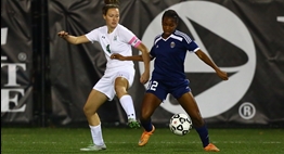 Girls soccer players from Walter Johnson and Perry Hall battle to control the ball in the 2016 State Finals.