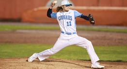 In the 2017 State Baseball 3A Final, a Chesapeake-AA pitcher hurls the ball towards home plate.