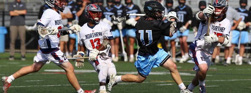 A male attacker prepares to shoot on goal surrounded by defenders in the 2019 Class 3A State Final.