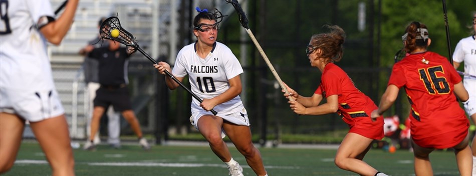 A female player races towards the goal with a defender on her at the 2019 Class 4A State Final.